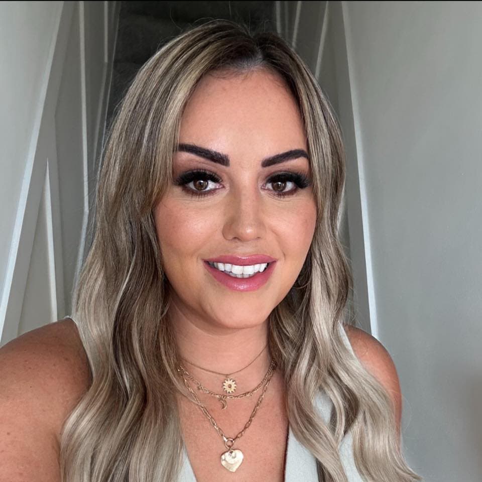 Aesthetician working with a client